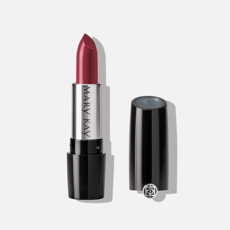 An open tube of Mary Kay Gel Semi-Shine Lipstick in the shade Scarlet Red.